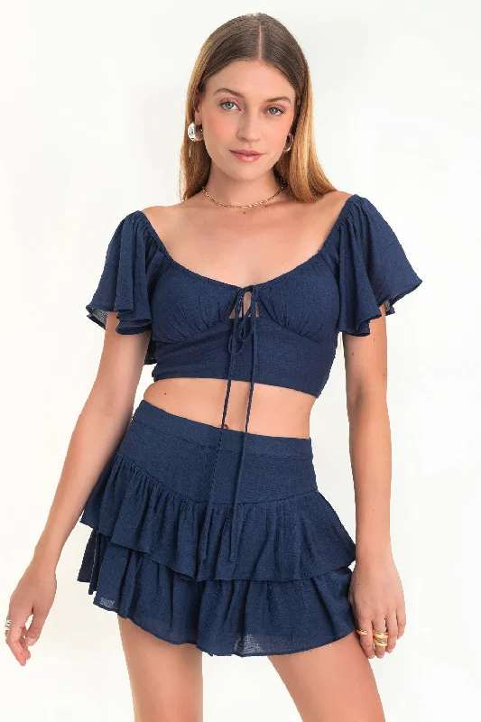 Falda short cintura alta con capas de olanes
