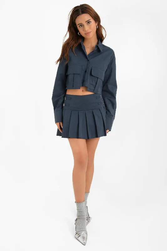 Falda short corto tableado con trabillas